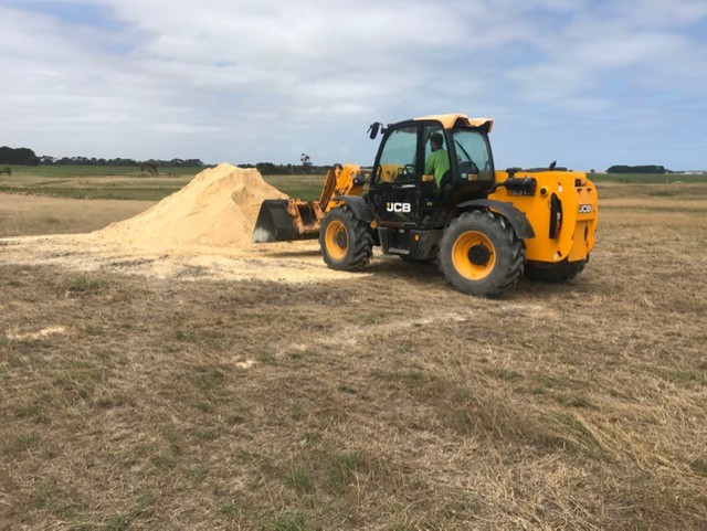 Loader lime pile